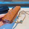 CHANEL チェーン付きスマホケース オレンジ