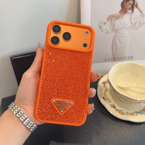 PRADA ストーン付きスマホケース ブラックホワイトオレンジ