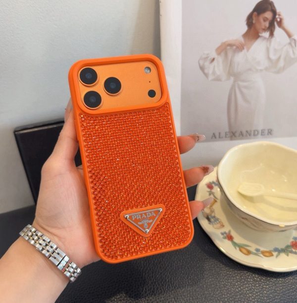 PRADA ストーン付きスマホケース ブラックホワイトオレンジ