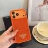 PRADA ストーン付きスマホケース ブラックホワイトオレンジ