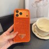 PRADA ストーン付きスマホケース ブラックホワイトオレンジ