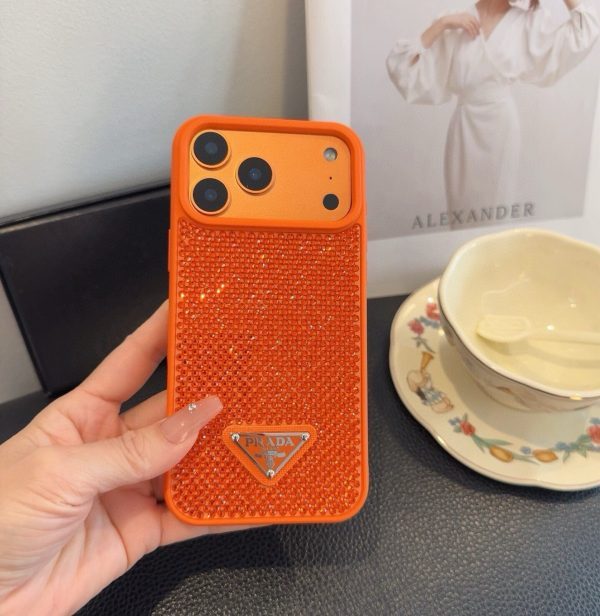 PRADA ストーン付きスマホケース ブラックホワイトオレンジ