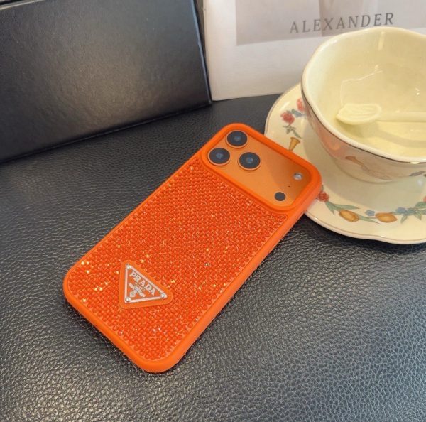 PRADA ストーン付きスマホケース ブラックホワイトオレンジ