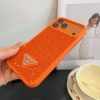 PRADA ストーン付きスマホケース ブラックホワイトオレンジ