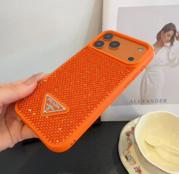 PRADA ストーン付きスマホケース ブラックホワイトオレンジ