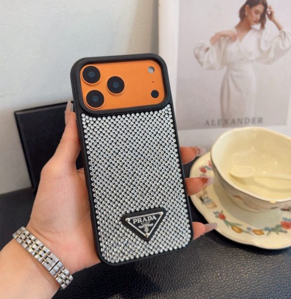 PRADA ストーン付きスマホケース ブラックホワイトオレンジ