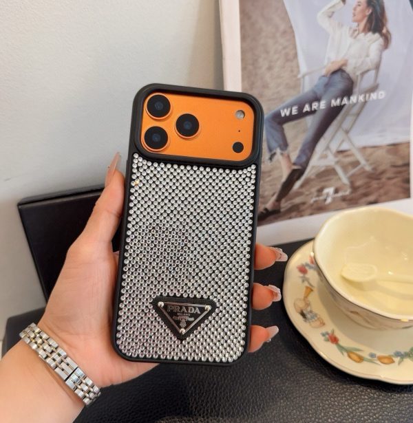 PRADA ストーン付きスマホケース ブラックホワイトオレンジ