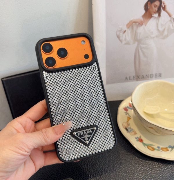 PRADA ストーン付きスマホケース ブラックホワイトオレンジ