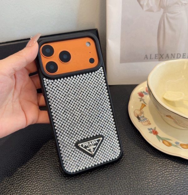 PRADA ストーン付きスマホケース ブラックホワイトオレンジ