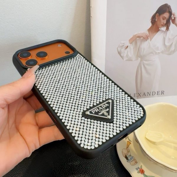 PRADA ストーン付きスマホケース ブラックホワイトオレンジ