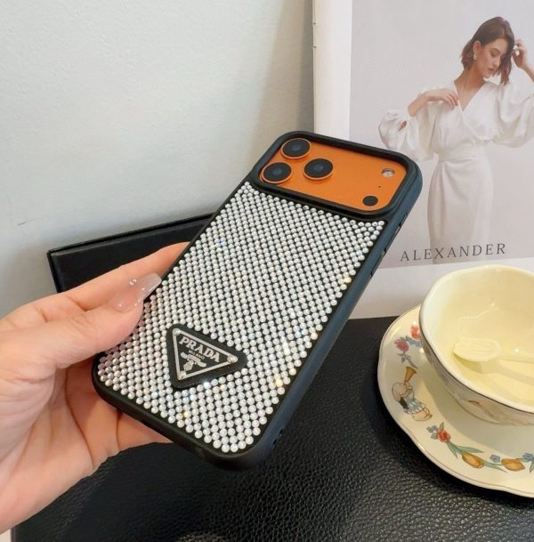 PRADA ストーン付きスマホケース ブラックホワイトオレンジ