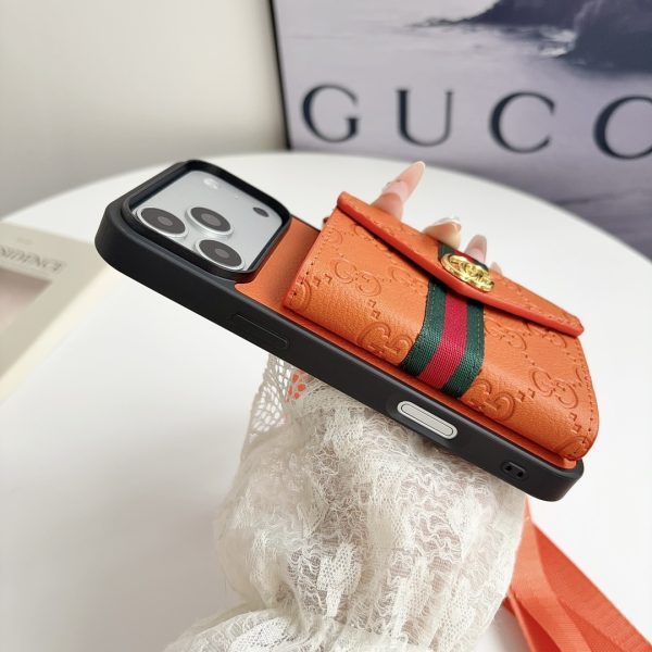 GUCCI エンボスカードケース オレンジ