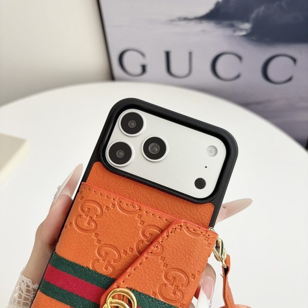 GUCCI エンボスカードケース オレンジ